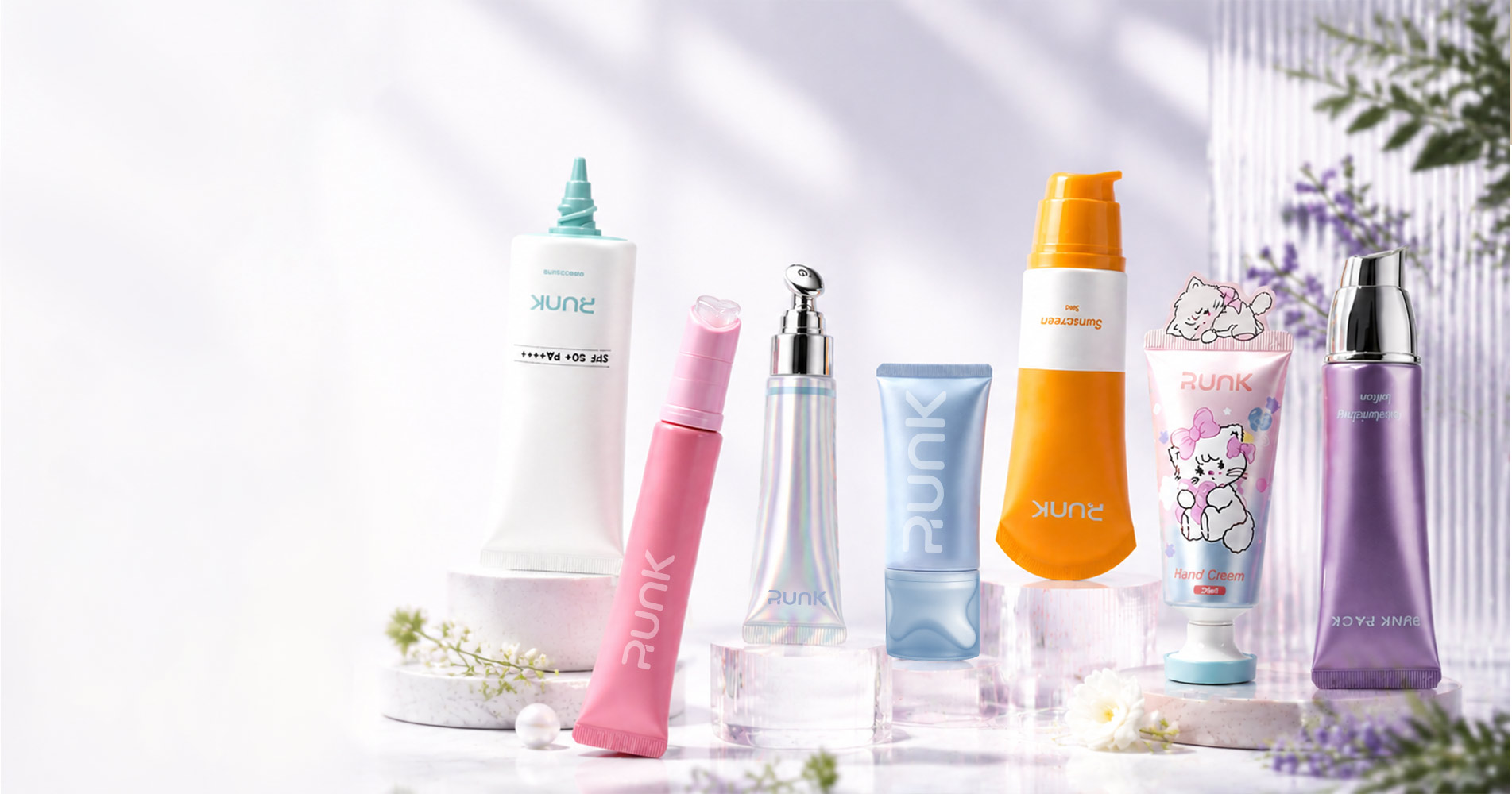 Tubo di plastica cosmetico con applicatore